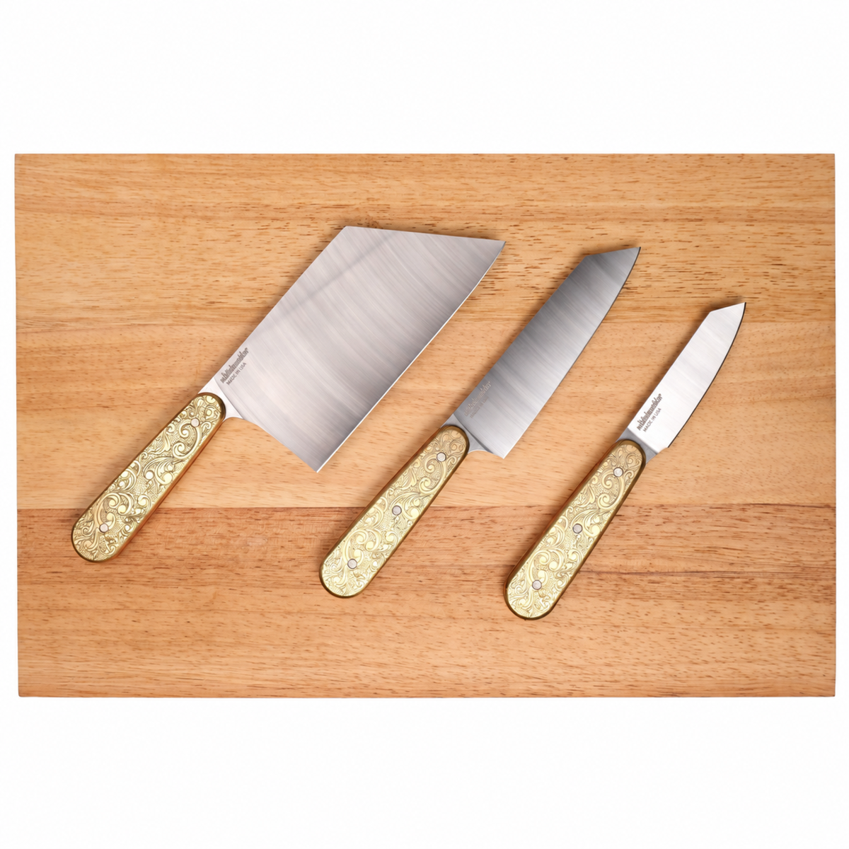 Doubloon knife set on plain cutting board
